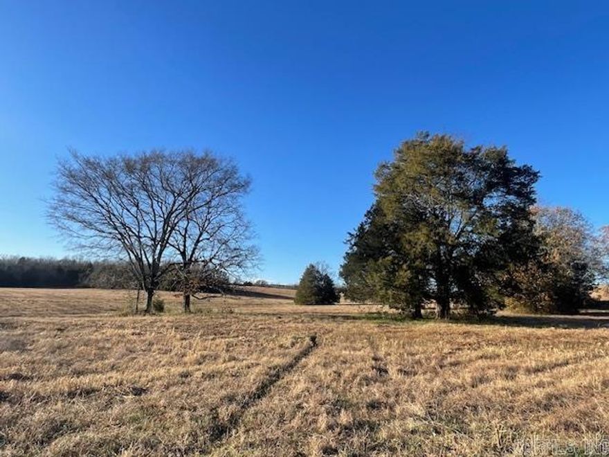 Land access by easement road, mostly cleared property.