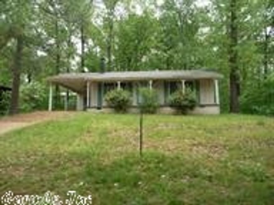 Great getaway home, retirement home, or first time homeowner home, sitting across the street from Lake Sequoyah. Has a fabulous seasonal view. Home  as real hardwood floors, freestanding wood burning stove with native stone surround, and a fenced in back yard. Home is in great shape. It is ready for you  to move in and call it home.