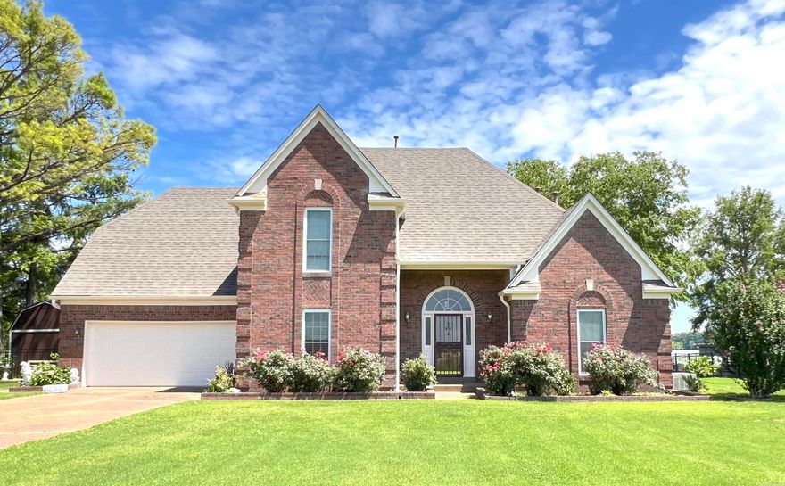 This four bedroom, three and a half bathroom piece of paradise is waiting for you on the banks of Horseshoe Lake!   There are two bedrooms and two and half bathrooms downstairs, as well as a living room with unobstructed views, a dining room, a great kitchen, an office, and a lake view breakfast nook! The upstairs has two more bedrooms and a bathroom as well as a very large bonus room that could fit several beds or would make a great game room! When you walk out the back door you are greeted with a large screened in porch and the best views on the lake! A few steps down to the water and you walk onto a dock with boat slips and a great amount of space to entertain! Water-sports, fishing, lake front access! This house has it all!    DOES NOT CONVEY: Chandeliers in entry way, master bathroom and master bathroom closet. Microwave in kitchen. Lion statues in front yard as well as 2 female statues in yard.