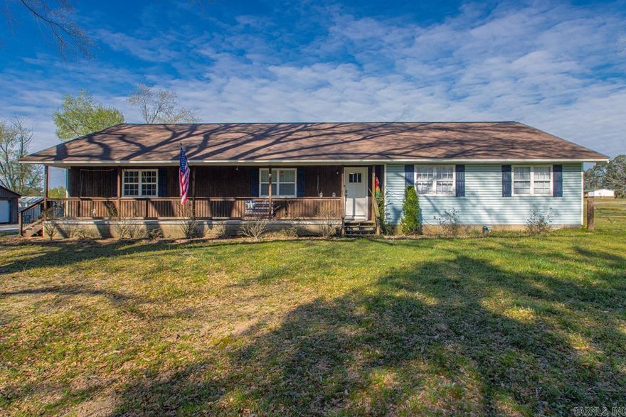 Escape to the ultimate rural retreat with this stunning 6-acre farm estate, perfectly designed for those who crave space, modern comfort, and a touch of the countryside. This meticulously updated three-bedroom, two-bathroom residence welcomes you with a charming front porch and a bright, open-concept interior featuring brand-new flooring, contemporary lighting, and stylish kitchen cabinetry. Practicality meets luxury with a massive living area, an oversized side-loading two-car garage. The upgrades include approx. 2024 roof, less than 5 years old HVAC. Enjoy the gas stove. The expansive primary suite serves as a private sanctuary with its own back porch access and a renovated bathroom complete with a generous walk-in closet. Beyond the home, the property is a hobbyist's dream, boasting a approx. 40x24 workshop, and an approx. 40x40 barn, and secure fencing currently optimized for horses. Whether you are looking to cultivate a homestead, house a collection of vehicles, or simply enjoy the peace of wide-open spaces, this turnkey property offers an unparalleled lifestyle opportunity that you won't want to miss.
