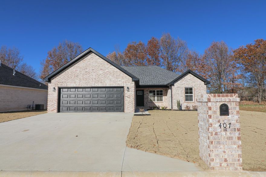 Welcome to the market 407 Gia in Bono, AR!! This home is located in Ridgepark Subdivision in Westside School District in a quiet neighborhood. This floorplan is open from the kitchen to the living area that is perfect for hosting friends and family. The kitchen includes a walk in pantry, granite counter tops, stainless appliances, and a island with bar stool seating. The master suite has a walk in closet with accent tile over the tub/shower area. The back yard sits on a tree line with plenty of privacy. This home qualifies for 100% financing so contact an agent today to schedule a tour!