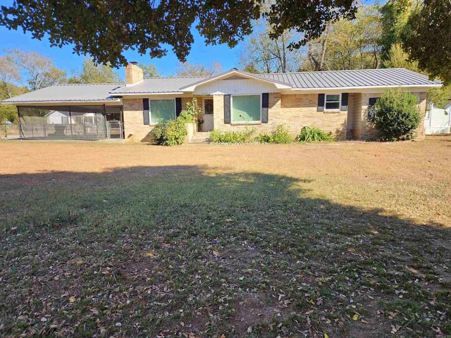 Clean Brick Home close to Lake Ouachita and Lake Hamilton Blakely Dam area, Metal Roof, Plenty of room in Back for RV and/or Boat, Large carport, A/C 2023, Small unfinished Building behind house, Move in Ready.