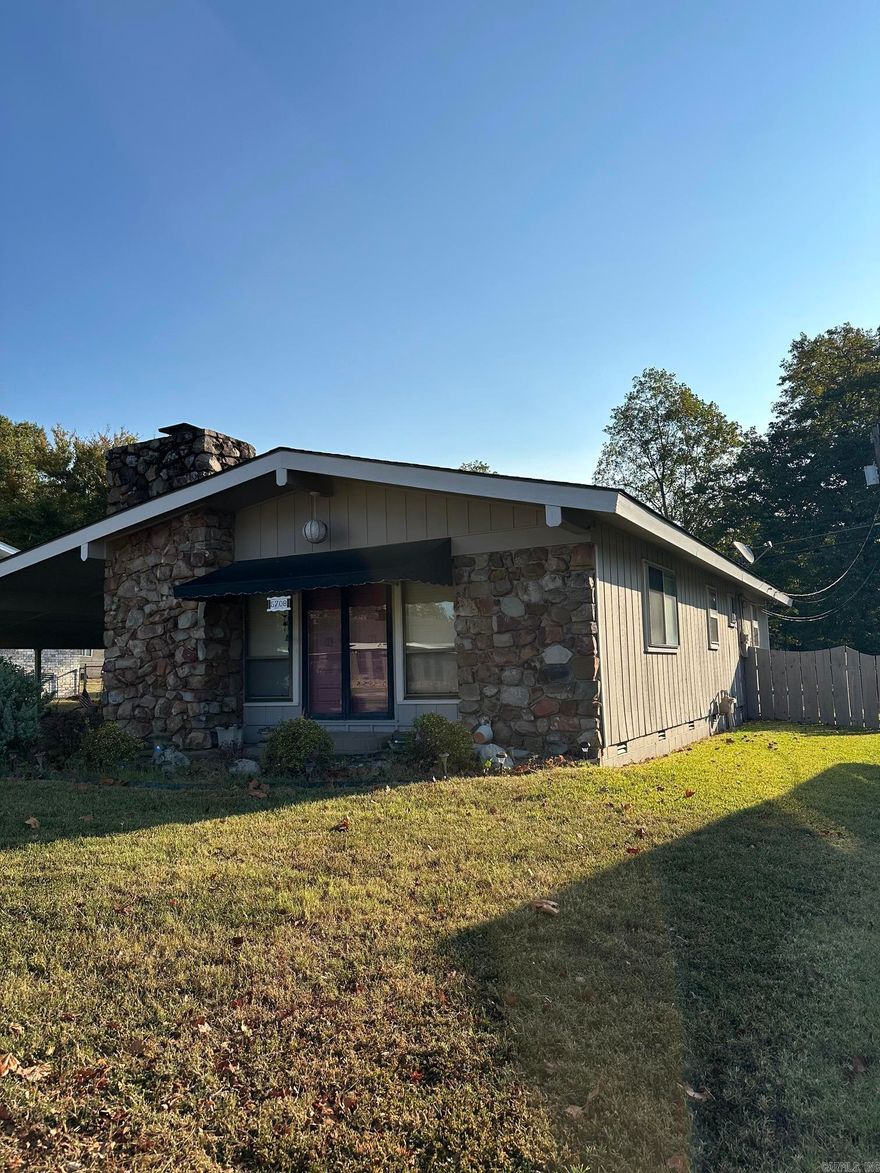 Well loved Family home with lots of charm! Open Living/Kitchen area with Fireplace. Formal Living Area with with Formal Dining. This home features good closet space! There is also a wood deck at the back of the home and a 10x10 storage building in the backyard. There is a chain link fence with wood at front and sides of the home and a great Storage area off the carport by the side door. You can also book your appointments to show the home. Call 501-244-0333.