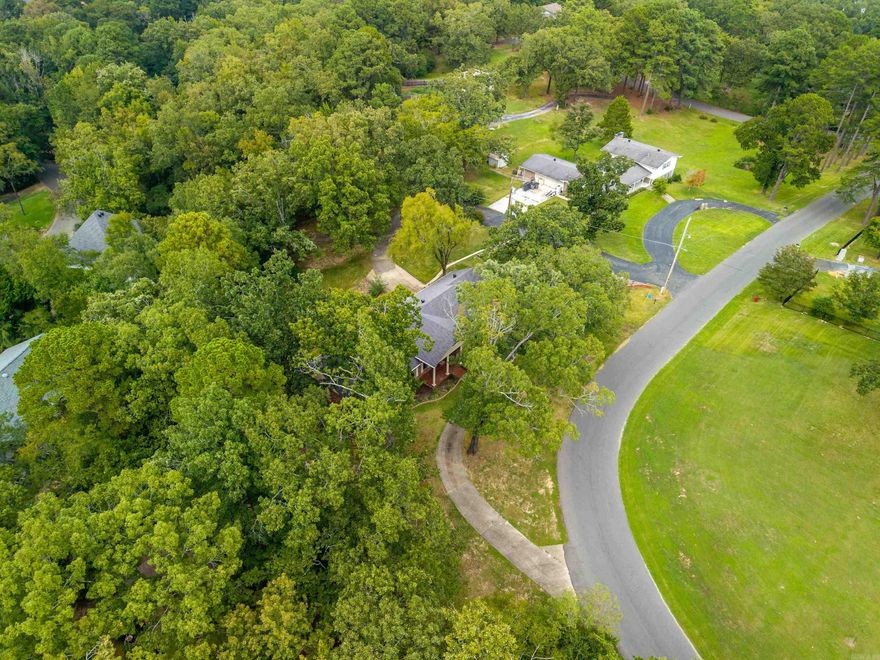 Looking for a ton of square footage and space for your growing family, but don't want to break the bank? This beautiful 4-bedroom, 3-bathroom home is nestled in the highly desirable Lakeside School District, boasting over 4,000 sq ft, and sits on a 1.18-acre lot adorned with mature trees and professionally landscaped grounds—offering both privacy and natural charm. Inside, you’ll find a well-designed layout with a spacious primary suite on the main level, ensuring comfort and easy access. The recently updated kitchen showcases modern appliances and stylish finishes—perfect for everyday living and entertaining alike. New flooring and updated light fixtures throughout the home bring a fresh, contemporary feel. Ideally located, this home is just minutes from top-rated schools, medical facilities, the country club, and a variety of shopping and dining options. Whether you're commuting, running errands, or enjoying a night out, convenience is right around the corner. Schedule your showing today!