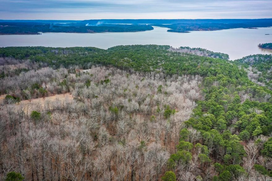 Welcome to 13.56 acres of paradise in Edgemont, AR! This beautiful piece of land is nestled between Greers Ferry & Fairfield Bay. Nearby Devils Fork Park, offers lake access to Greers Ferry Lake. This prime location provides you with all the amenities of the two towns nearby including shopping, liquor shops, and golf. Enjoy beautiful views of the lake, two creeks, and pond on the property. Full of wildlife & serenity, this is the perfect spot for your dream home! With easy access to all the amenities of Greers Ferry and Fairfield Bay, you can have the best of both worlds- a peaceful, secluded retreat & all the activities you would want! Don't miss this opportunity to own a slice of paradise.