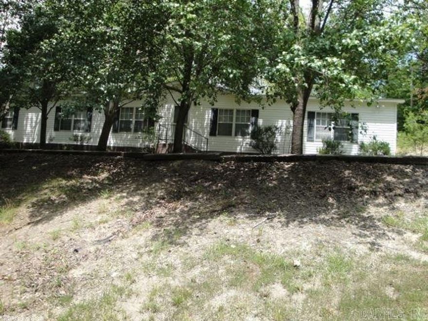 Country living and only 15 minutes to the interstate. Spacious, 2240 sqft mobile home with a permanent foundation and on 7 acres of land with a storage building.  New flooring in master bedroom, living room, and washroom.  New countertops, sinks, faucets, porcelain sinks in bathroom.  New appliances.  Fireplace never been used.  Spring blooming trees across the front  yard.  US Bank, Summit Bank, or Wells Fargo for mobile loans that have permanent foundations.  Built 1995.  Great shape mobile.