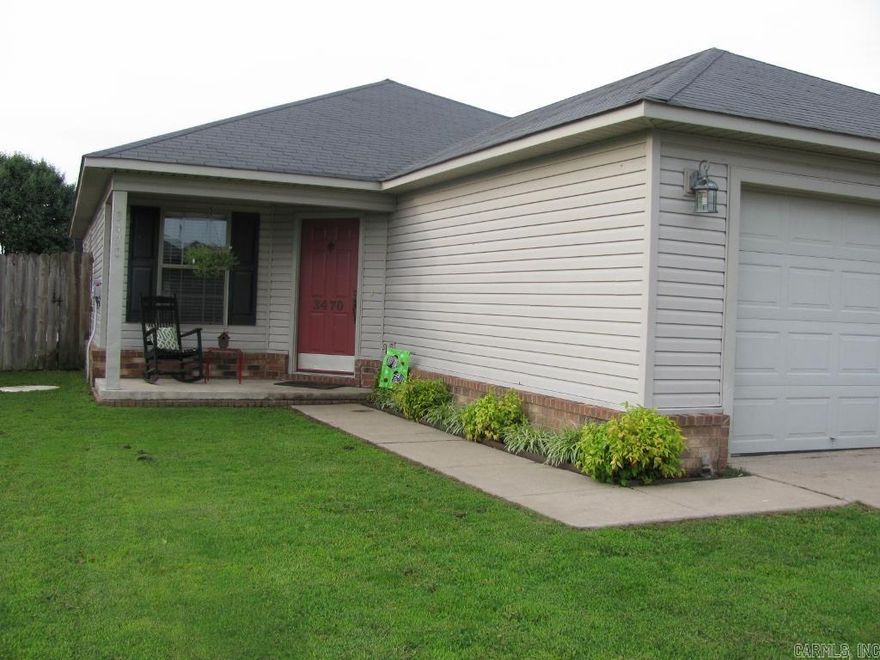 Here is a very well, nice, maintained home built in 2006 and still looks new.It has a manicured yard with a privacy fence in back and deck. It has a master bdr with double doors going outside. Nice mst bath. Mst Bdr. is split from other 2 bedrooms. Custom Cabinets with a bar and a dining area and formal living room with an open floor plan, beautiful floors. Laundry room. You will love this home when you see it. Priced right, motivated seller. Qualifies for USDA, 100% finan Sq ft is approx., please measure.