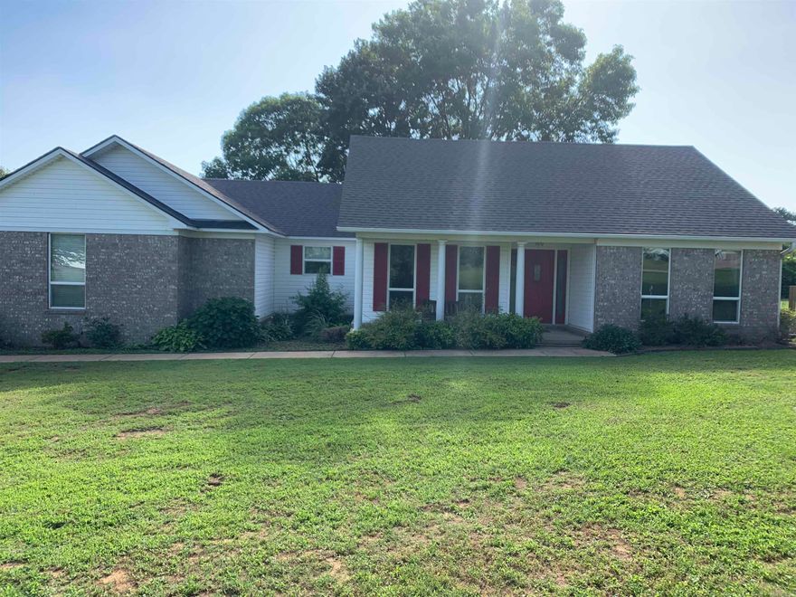 Country Living at its finest. Just over an acre and a half of land its the perfect amount to give you and your family room to roam. Spacious Living Room with tray ceilings. There is a beautiful dining room. Split floor plan. Fireplace with ventless firelogs. Master bedroom has tray ceilings with huge bathroom, separate shower, jacuzzi tub, double vanities and a huge walk in closet. Master has a door leading to a large deck w/fenced in backyard. Barn with woodworking shop and loft. New windows in 2015. Roof, HVAC, and hot water heater have all been replaced within the last 5 years. This is a well kept country home that will make a perfect place to raise a family or retire on the farm. Agents See remarks!!