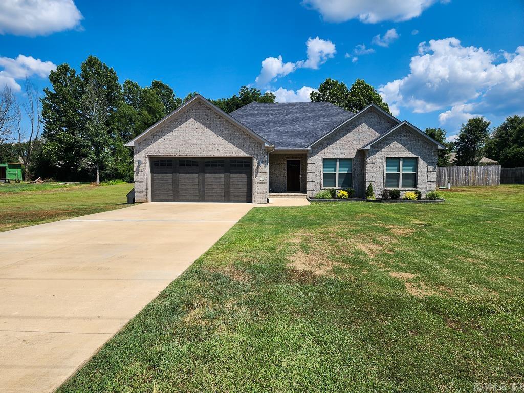 Located in the sought-after Cornerstone Subdivision in Springhill and less than a mile from Springhill Elementary, this full-brick 4-bedroom, 2-bath home offers 1,921sqft on a spacious 0.84-acre lot. Built in 2022, it features a split floor plan with an oversized primary suite, tray ceilings, crown moulding, dual vanities, a soaker tub, custom tile shower, and private toilet room. Ceramic wood-look tile runs throughout the homeāno carpet. The kitchen includes granite countertops, a farm-style sink, free-standing range, built-in microwave, and dishwasher. With the right offer, the refrigerator, washer, and dryer in the oversized laundry room may convey. The open living area is perfect for entertaining, and the fully fenced backyard features a large covered patio with a mounted TV. All systems and the roof are only 3 years old. Attached 2-car garage, quiet neighborhood, and move-in readyādonāt miss your chance to own in the Greenbrier School District!