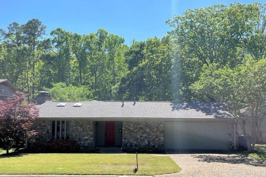 Mom/Dad & Kids can walk to the neighborhood Park/Pool areas * Move-in-Ready Brick/Stone 1-level home has a BRAND NEW Architectural Class 3 Impact Resistant Roof (3/2025) that LOWERS your insurance * Spacious Kitchen features an Island and solid surface countertops * Beamed Cathedral Ceiling in Greatroom * Remodeled Baths, recessed lighting * Carpet in Bedrooms only * Vinyl Replacement windows, ceiling fans, NEST thermostat & tree shaded lot for utility savings * Relax and grill out on your 700 sq.ft. Deck that backs to the greenbelt & creek - access Deck from kitchen or french doors off MBR * Large Utility Room & oversized double garage * Move-In Ready ... hurry!   See Agent Remarks - using Broker Bay app to set Showings