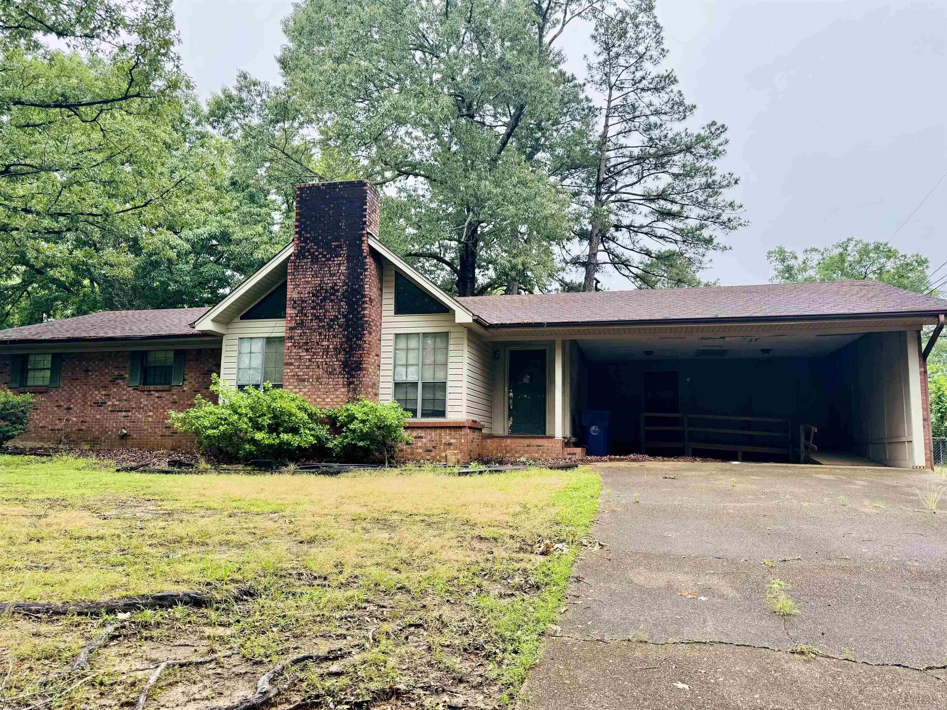 This classic brick house, boasting 3 bedrooms and 2 bathrooms, is brimming with potential and awaits your creative touch. Nestled in a desirable location, this property offers a unique opportunity to create your dream home while capitalizing on its inherent character. While it requires some TLC, the solid brick construction and well -proportioned layout provide a fantastic foundation for a stunning renovation. Sold as is where is, no property disclosure available, seller has never resided in residence. Taxes and acreage taken from courthouse records.