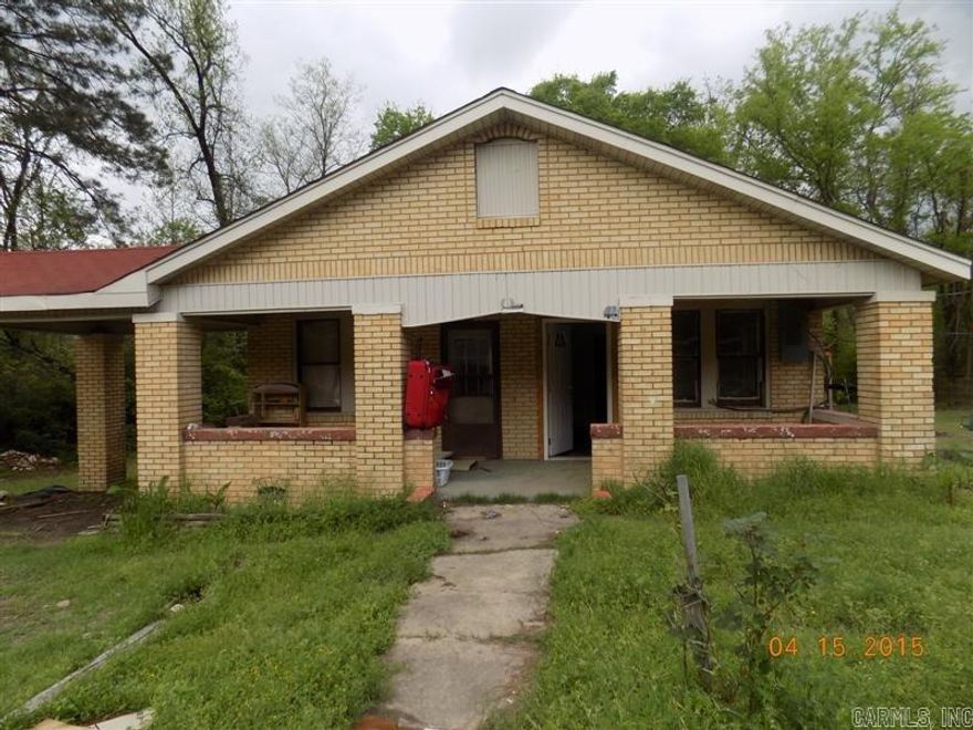Great investment opportunity!!  Approximately 1560 SF brick home with 2 bedrooms, 2 baths (but walls that were removed to enlarge rooms could easily be replaced to make this a 3 bedroom again!!), separate dining room and laundry room - all sitting on 1 acre (according to tax records) with a nice storage bldg that could be used as a small workshop!  Agents see confidential remarks for showing instructions and additional information.