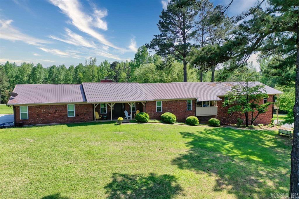 Welcome to your new dream home! This stunning 10 bed, 5 bath estate boasts an impressive 5816 sqft of living space and sits on a sprawling 18 acre tract that offers unparalleled privacy and serenity. Located in a peaceful country setting, this property is the perfect retreat for anyone looking to escape the hustle and bustle of city life and enjoy the tranquility of nature. Step inside and you'll be struck by the vaulted ceiling in the living room space that flows into the open concept kitchen. The bedrooms are spacious and comfortable and come with plenty of closet space. Outside you will find a sparkling pool that is perfect for those hot summer days, with plenty of storage and covered areas to sit and sip a drink of your choice. There is also a large shop that can be used for storage, woodworking, or any other hobby that requires extra space. Don't miss out on your chance to own this stunning estate - book a showing today and experience the ultimate in country living. Agents, please see confidential remarks.