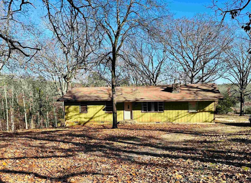 This cute 2 bedroom, 2 bathroom house sits on 2 beautiful acres close to Greers Ferry Lake (5 boat ramps within 15 minute drive) and in Quitman school district.  This home has an enclosed carport that can be converted back to carport. The large, beautiful rock fireplace is the feature as you enter the home, new laminate floors (1 1/2 years old) in living room, dining room, kitchen and hallway.  Roof and HVAC approx 7 years old.  Call today to schedule your showing and make this home your own!  Mineral rights convey. Seller is offering $5000.00 to be placed in escrow for repairs with acceptable offer.