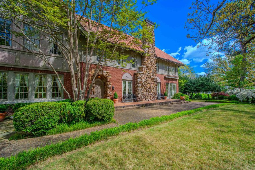 Historically significant Boone English Tudor (1927) situated an approx. ½ acres. This home was designed by Thompson and Harding. Features exterior with field stone, brick, and stucco. Home also features all listed and more, grand foyer with open staircase with landing. 17x25 site-built fireplace, seamlessly opens to a serene sunroom. 15X20 Formal dining room with access to covered patio and butler’s pantry. Full built in kitchen has back staircase to upstairs, it leads to separate breakfast room, with access to cover patio, 3 or 4 Bedroom, 3 full baths. 18x21 master suite with its cozy built-in fireplace and remodeled bath. 4th Bedroom could be nursery or study, separate full laundry, walk up attic, separate detached structural 1 car garage & 450 sq ft guest qtrs. Site built hardwoods floors through-out. Complete with a security system, whole-house generator, and sprinkle system. Interior access to 300 sq ft basement. Agents, please look in remarks.