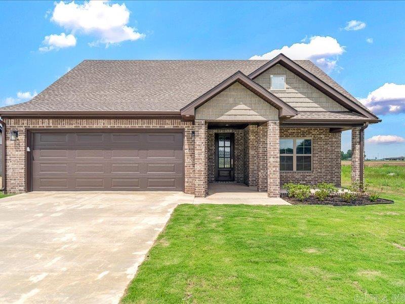 Welcome to your new home in the highly sought-after Pintail Pointe subdivision in Manila, Arkansas! This stunning three-bedroom, two-bathroom home is perfect for those looking for a modern, spacious living environment. The open floor plan creates a seamless flow between the living, dining, and kitchen areas, making it ideal for both daily living and entertaining. The kitchen boasts beautiful granite countertops and comes fully equipped with sleek stainless steel appliances, perfect for preparing meals in style. The bathrooms feature luxurious touches, including a ceramic tile shower, creating a spa-like atmosphere. The large master bedroom is a true retreat, complete with an expansive walk-in closet that provides ample space for all your wardrobe needs. Additional storage is abundant throughout the home, with large closets and smartly designed spaces to help keep things organized. Situated on a large, level lot, the home offers plenty of outdoor space for family activities or relaxation. Located in the new Pintail Pointe subdivision, you'll enjoy a quiet, welcoming community while being just minutes away from all the amenities Manila has to offer.