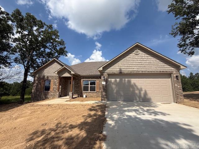 Looking for a new home on a large lot. This is it! Enjoy the view from your back porch. You will likely see a few deer. Large living room open to the kitchen. Nice sized island in the kitchen with cabinetry in the island. Guest rooms are separate from the primary bedroom. Has a nice yard with trees. The backyard is private with woods behind the home.