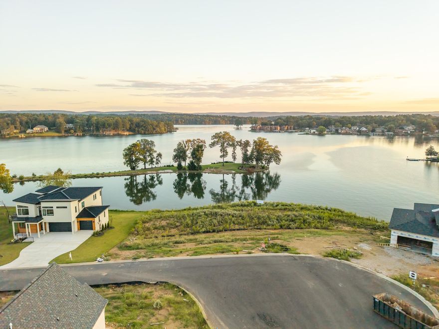 Build your dream home and enjoy some of the best views on the lake from this prime lot in Vista Point, a gated subdivision offering a community greenway, picnic area on the peninsula, and a neighborhood boat ramp for easy lake access. Conveniently located near all the shopping, dining, and entertainment Hot Springs has to offer. Plenty of lake frontage to add your own boat dock.