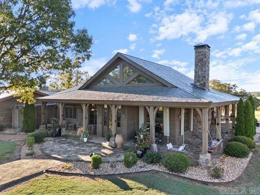 Experience the breathtaking beauty of this extraordinary fenced and cross-fenced 25.63 homestead ranch for the outdoor or equestrian enthusiast- newly remodeled enclosed 2400 s.f. barn with 6 stalls, concrete floors, 1/2 bath w/elec.HWH for washing animals with hot water. There are 3 stalls in the ancillary barn (with electric and water) within fenced 2.5 acres. Check out the new 175 X 50 state of art riding arena with electricity. Close to the 1/4 acre pond is a picnic area and fire pit. The new oversized concrete saltwater sport pool and spa is heated and has a tanning shelf and hot tub with many water features. All this is surrounded by 1400 acres of a neighboring cattle ranch.  Reminiscent of Big Cedar Lodge, the house is almost indescribable! see attached docs...(agents: must have pre-approval to show)