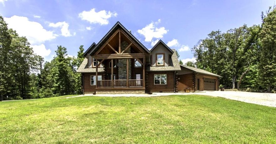 This stunning custom-built log cabin was completed in 2022 and sits on 10 acres just minutes from Pocahontas, AR. With 2,257 square feet, this two-story home features 3 bedrooms, 2.5 bathrooms, and is constructed from solid white pine logs, offering rustic charm with high-end finishes.  Inside, enjoy the warmth of white pine tongue-and-groove walls, a vaulted ceiling, and a dramatic stone fireplace in the living room. The open-concept kitchen is fully equipped with all appliances, quartz countertops, a center island, and a walk-in pantry — perfect for home cooks or entertaining guests.  Key Features: 3 Bedrooms | 2.5 Bathrooms | 2,257 Sq Ft White Pine Log Construction (Completed 2022) Vaulted Ceilings & Massive Stone Fireplace Central H/A| Built-in Backup Generator Fully Equipped Kitchen w/ Quartz Countertops Large Mudroom /Laundry Room Combo Oversized 32x24 Two-Car Garage (Tongue & Groove Interior) 30x30 Workshop with Power & Overhead Door Outdoor Patio w/stone fireplace & gas grill 10 Acres is partly wooded with Seasonal creek  Located Just 5 miles from Pocahontas in Randolph County AR that is known for its 5 rivers that surround the county.