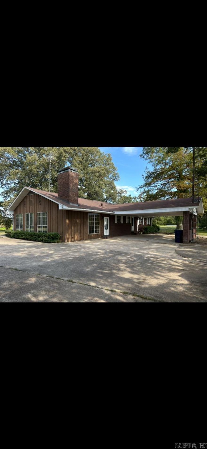Enjoy the tranquility of country living in this spacious home sitting on 10 acres just outside of town. The home has 3 bedrooms, but could easily be converted to 5. The pasture is fenced with a shed and grain bin if you choose to have horses, cows, etc. The home has recently had extensive work on foundation, roof, electrical, plumbing as well as new flooring, appliances, lighting, paint, sink fixtures, etc., etc. New heat and air systems a year ago. A large den with a wet bar & fireplace provides ample room for entertaining, Oversize primary bedroom has a fireplace, 2 walk in closets.  In addition to the 3 bedrooms, there's a large room for an office or game room with a bonus room upstairs.