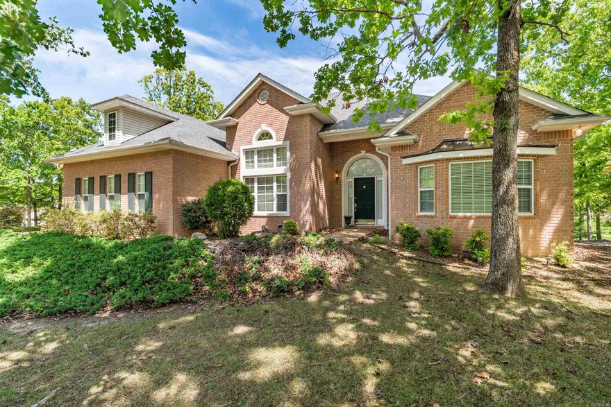 Enjoy golf course living from this well-maintained 3 bed, 2 bath home overlooking the tee box of Hole 9 on Magellan Golf Course. Located just 5 minutes from Balboa Beach, this home offers a great blend of golf and lake; the Hot Springs Village lifestyle.  Inside, the home features a comfortable one-level layout with high ceilings, tall windows, and a spacious living area filled with natural light. A separate dining room and breakfast area provide flexibility for everyday living and entertaining. The kitchen offers generous cabinet space, a breakfast bar, pantry, and included appliances. An office/study with built-ins provides a great space for work or hobbies.  The primary suite is privately set apart from the guest bedrooms, offering a more secluded retreat. It features a double walk-in closets, walk-in shower, and separate tub. Two guest bedrooms on the main level provide comfortable space for family and guests.   Out back, enjoy the covered deck and peaceful golf course setting with views toward Magellan’s 9th tee. With golf course frontage, a two-car garage, and quick access to Balboa Beach, this home is a great opportunity in Hot Springs Village.  SEE AGENT REMARKS