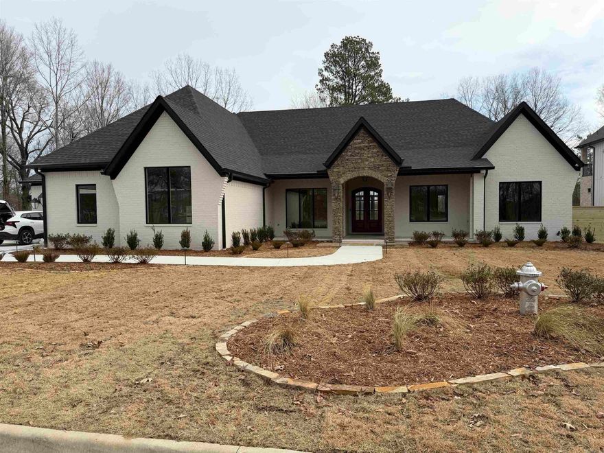 Beautiful Neighborhood and absolutely wonderful Home that has everything Walk Paths, Beautiful Bayou to Kayak and fish in. New Home 4 car garage with safe room