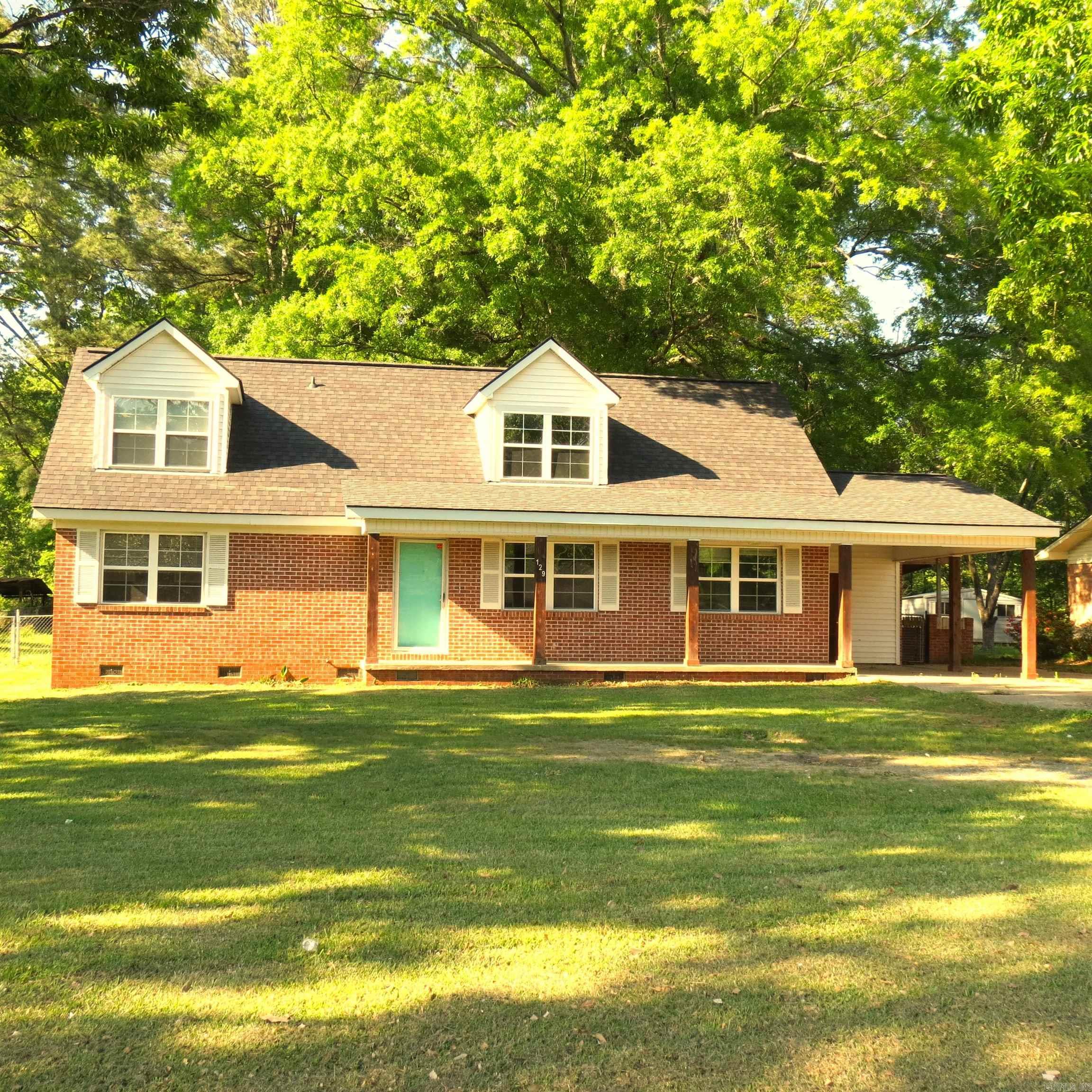 Cute home with so much potential!! 4 bedrooms, 2 bath home with fenced backyard. 2 bedrooms downstairs, 2 bedrooms upstairs. This home has hardwood floors. Upstairs the carpet has been removed and wood floor is ready to be refinished. Home still needs some trim work, base boards etc. These finishing touches will make this your new home. Shop in back yard is wired for electricity, for a workshop or man cave. Call today to make this your new home!!