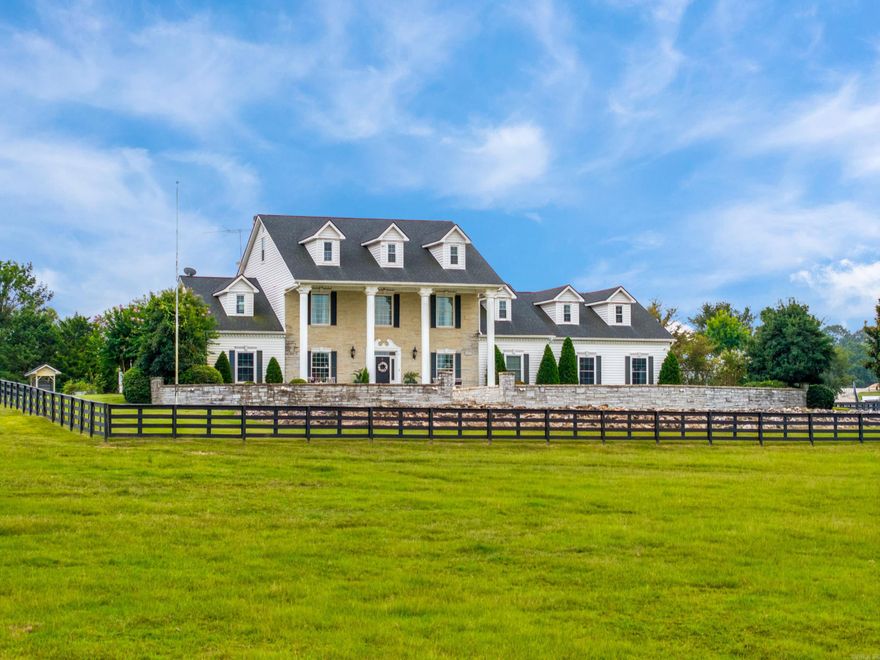 Secluded Luxury Estate on Lost Creek- 36 acres of Private Paradise. An extraordinary countryside retreat of 8000 sq ft of refined living space. Designed for privacy, comfort and elegance, this estate blends luxury living with peaceful rural charm. Property highlights include 6 bedrooms, 5 full bathrooms + 2 half baths, soaring ceilings and refined finishes throughout. High end appliances, formal dining room, two home offices and flexible bonus spaces. 2 fireplaces-a wood burning fireplace with gas starter downstairs and gas logs in main bedroom suite upstairs. 4-car garage, private gated entrance, in-ground swimming pool, Briggs and Straton Vortec 305 V8 generator with dedicated natural gas, expansive acreage for horses, livestock or recreation. This property delivers endless possibilities.  Schedule your private tour and experience this spectacular setting!