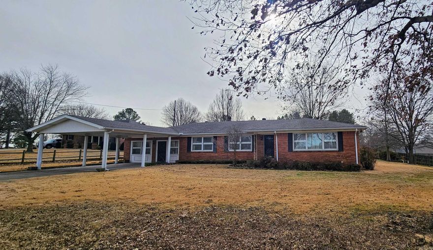 This well kept single story home offers over 2,300 square feet of living space. Featuring 3 bedrooms, 2.5 bathrooms, two spacious living areas, an open kitchen, a separate dining room & an electric fireplace that adds a warm touch to the den. This layout works well for both everyday living and hosting family and friends. The bedrooms are impressively large, giving everyone their own comfortable space. You'll also appreciate the amount of storage throughout the home with numerous closets and extra storage areas. Situated on 1.14 acres this property offers the convenience of town while still giving you room to enjoy the outdoors. The spacious layout and large lot create the perfect setting for a new family to move in and make it home.