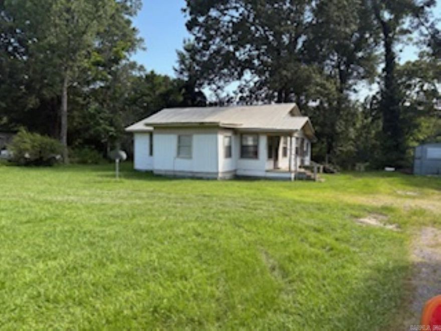 Water Front Property onto Des Arc Bayou. 2 Br, 1 Bath home. DIY walk steps down to the Bayou. 2/3 of an acre. Hwy 11 frontage also. New flooring and some updates done. Unrestricted property with the bayou access to fish and launch your boat if desired. Property line extends into the bayou. Would make a nice get away or a nice starter home. In Prairie County and just 2 miles north of Des Arc outside city limits. Entergy is the electric provider, Des Arc city water and septic service. As the listing agent and owner of the property, we would love to show it to you. Thanks, and we wish you the best.