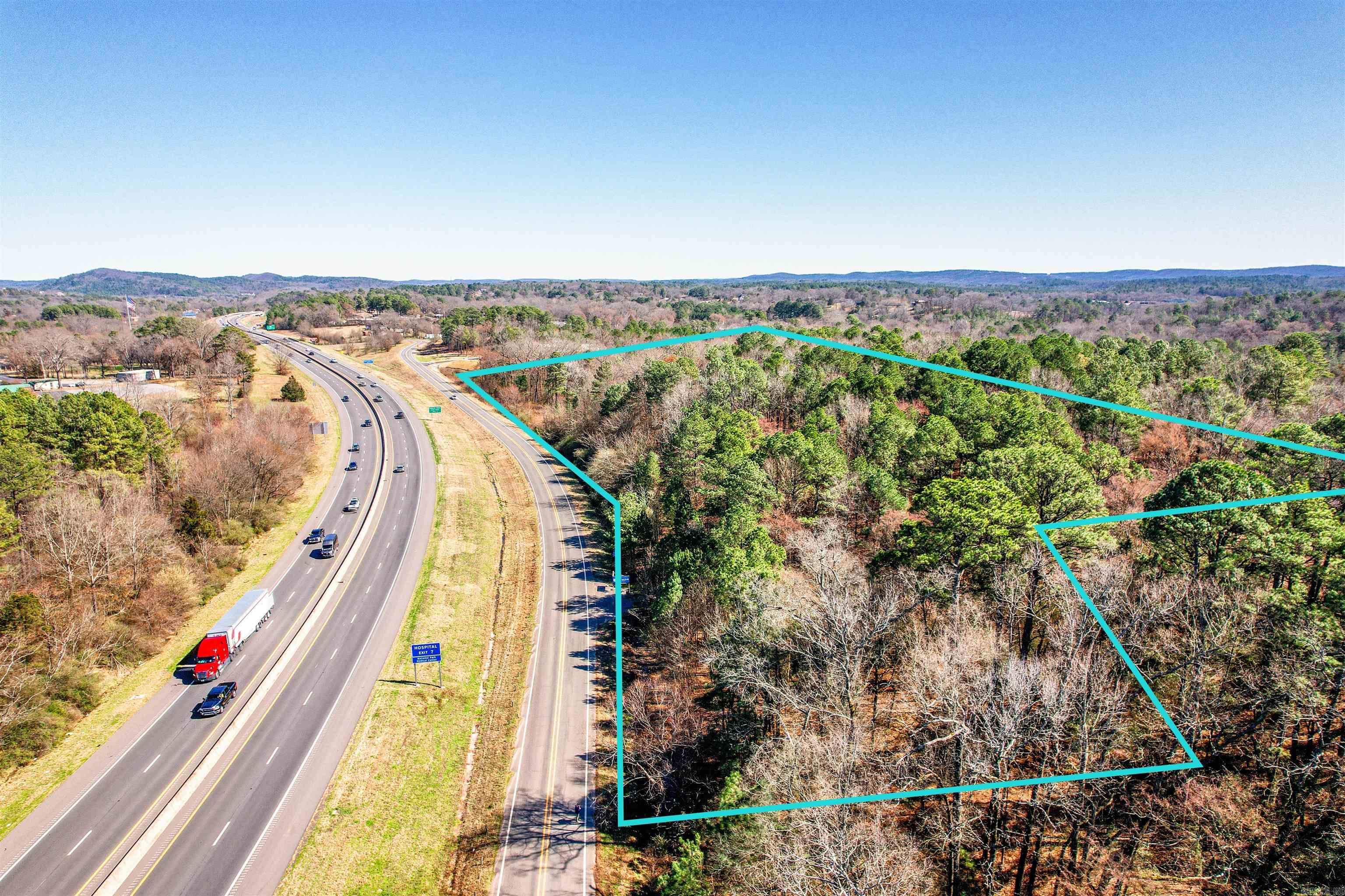 Amazing opportunity to purchase 13.16+/- acres with over 1,360' of Martin Luther King Expressway visibility. One of the highest traffic corridors in Hot Springs, this location is ideal for anyone looking for a prime location with great visibility and plenty of space to accommodate all your needs.