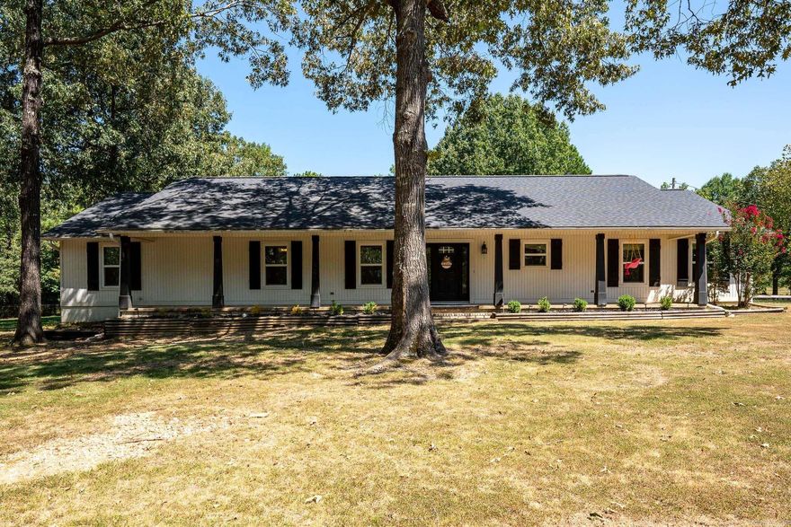 Seller to offer $5,000 towards buyer's closing costs & prepaids with accepted offer.  Fabulous, recently updated, 4 bed, 3.5 bath home situated w/privacy in mind on right under 3 acres! An absolute entertainer’s dream inside & out! The large vaulted living room is open to the recently updated, oversized kitchen w/tons of professionally painted cabinets, storage, granite countertops, custom lighting, & a gas range (2021) The second living area, w/a full bath attached, has had an entire makeover w/custom built-in cabinets, wooden floating shelves & brand new carpet. The mudroom/laundry room will leave you speechless w/the perfect custom built-in cabinets, white quartz countertops, & farmhouse sink. All bedrooms also have fresh, new carpet that is less than a few weeks old! Primary suite offers an updated walk in shower & vanity! Relaxing is easy to do outside on the front porch or covered back patio! The 25 x 50 detached garage/shop is divided into an oversized 2-bay garage on one side & an additional two-bay heated & cooled shop-area on the other side. The property offers a large flat, wooded front yard, & a fully fenced backyard. Please read the agent remarks.