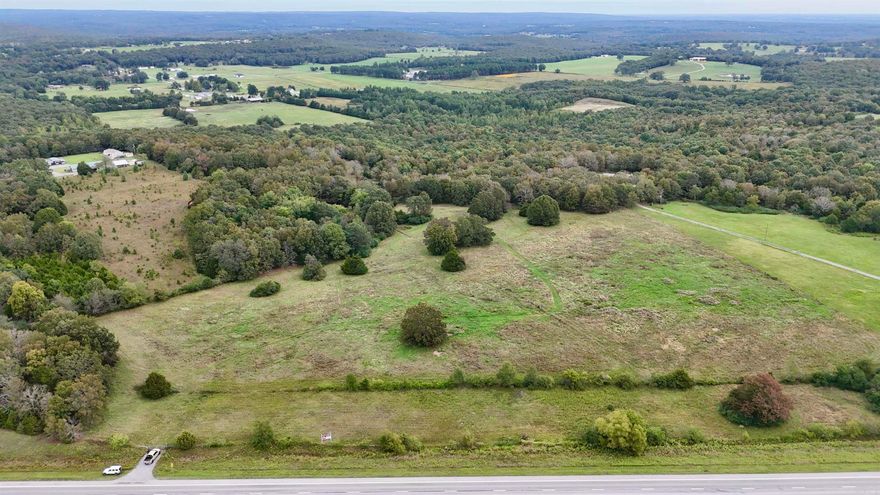 This beautiful property is a once in a life time buy. It is Owner financing with a 0% interest rate! Seller is requiring 10% ($42,000) down minimum but prefers $60,000 down. Seller is willing to finance out to 20 years and each monthly payment goes 100% to the principal. This land has the best of every world with over 1300' of highway frontage, approximately 24 acres of pasture with a pond, perfect for cattle or even for building you dream home. 40 acres are wooded with creeks and hill. It has not been hunted in 25 years so the wildlife is everywhere. It is an oasis for deer and turkey. The owner has also seen fox, ground hog, quail, dove, and rabbit throughout the land. Don't miss out on this unique opportunity for 0% interest rate and for your dream property for hunting, cattle, or your dream home.