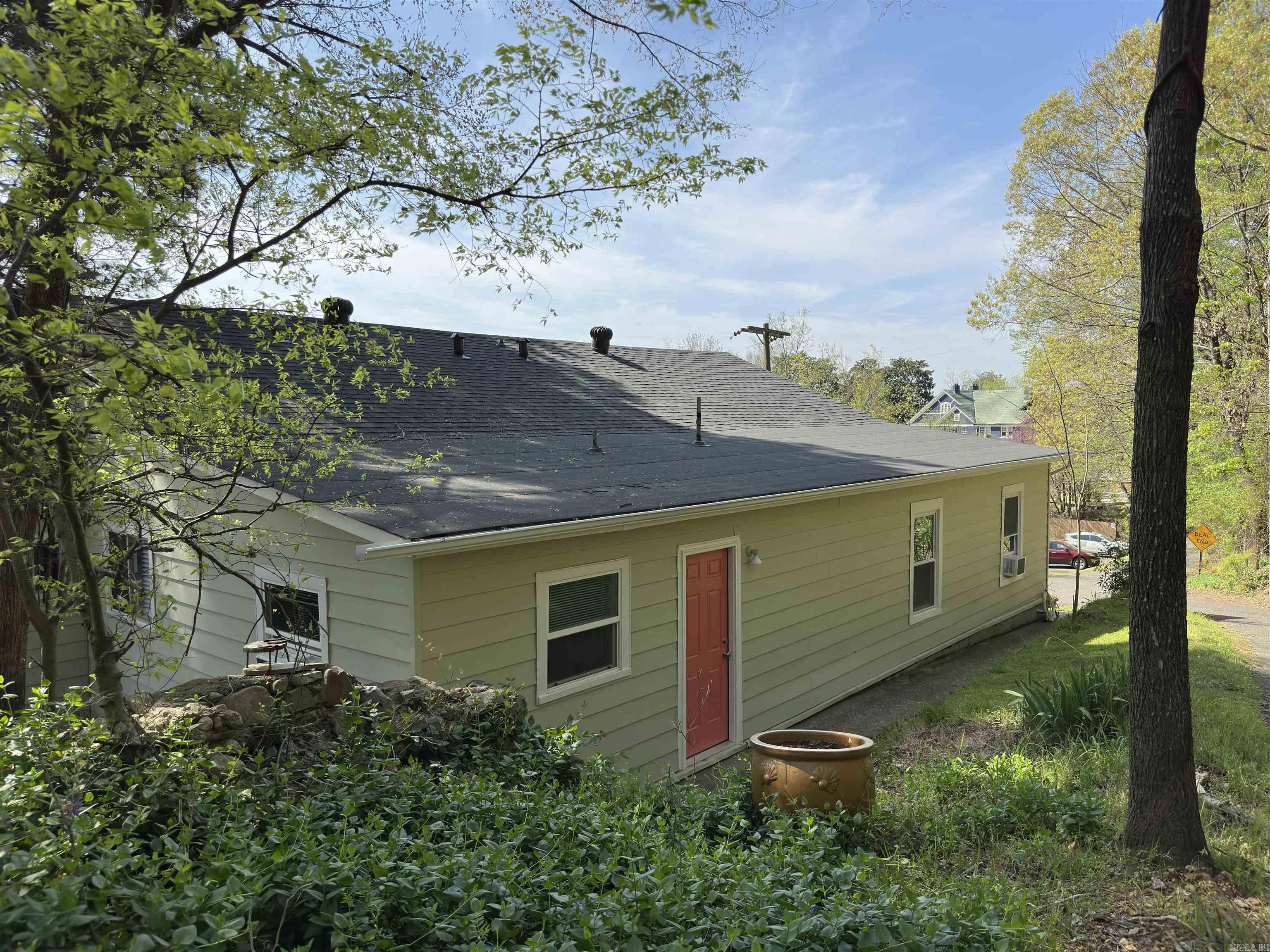 Rare find, located up against West Mountain! 4 units all remodeled and rented for an easy transition to the new owner. Care was taken to maintain the charm of the orig. 1940 building while bringing in modern fixtures and appliances. New roof and many other upgrades. Quiet location close to downtown Hot Springs National Park, Bathhouse Row, Dining, Oaklawn Racing & Casino. No special considerations are needed for that on this property situated in the Historic District. Dead end of the Street with ample parking lot. Hiking Trail down the road for West Mt. Efficient units all different layouts and sizes. Fully rented at the time of listing.