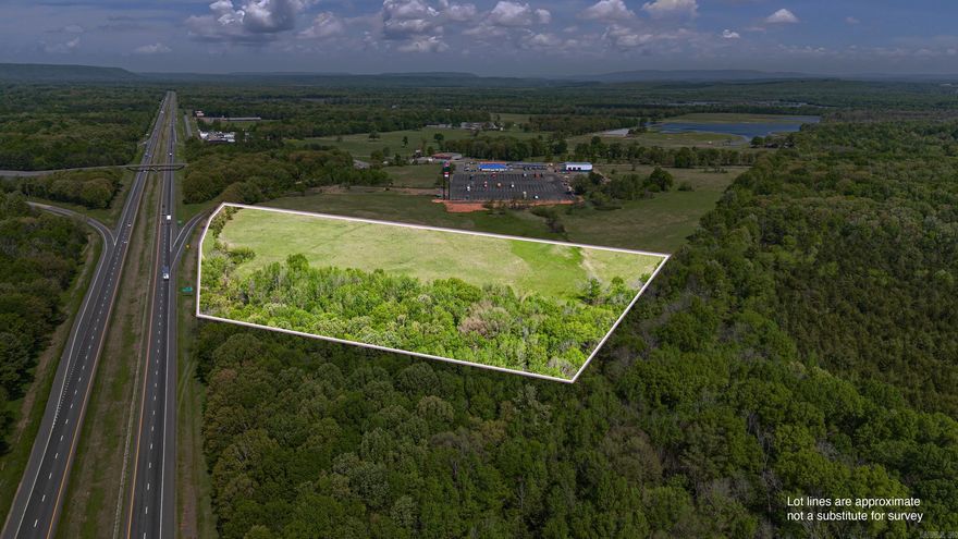 PRIME VACANT LAND – 15 Acres w/ Interstate Frontage | Atkins, AR  Looking for land that checks all the boxes? This 15-acre, flat parcel is ready for development and packed with potential. Located right off the interstate and next to the newly remodeled TA Truck Stop, it’s a golden opportunity for your next big move.  Endless Possibilities – Perfect for your vision—whether you’re thinking commercial, residential, recreational, or investment.  High Visibility & Prime Location – Interstate frontage with consistent traffic flow  Truck Stop Adjacent – Tap into an existing high-traffic hub  Strategic Location – Easy access for travelers, truckers, and locals alike  This one’s a rare find—don’t miss your opportunity to own a prime piece of acreage or commercial land located in Atkins, AR. Reach out today to walk the property!