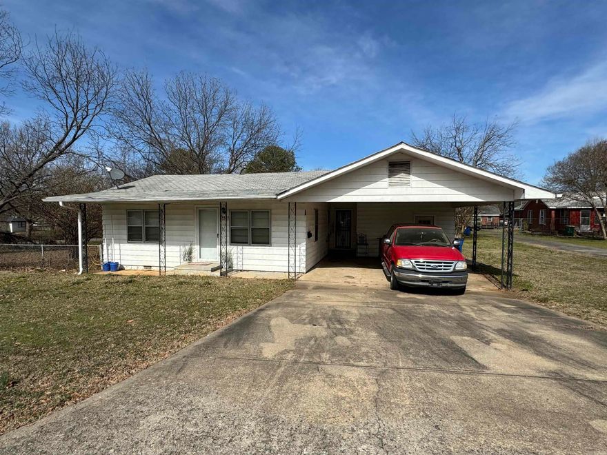 This charming three-bedroom, two-bathroom home is nestled in a serene, well-maintained neighborhood. Featuring laminate and original hardwood floors, this cozy abode offers ample privacy. With a little tender loving care and minor repairs, this house has great potential. Sold as-is with no warranties or repairs, this vacant property is ready for your personal touch. Agents, please refer to the confidential remarks.