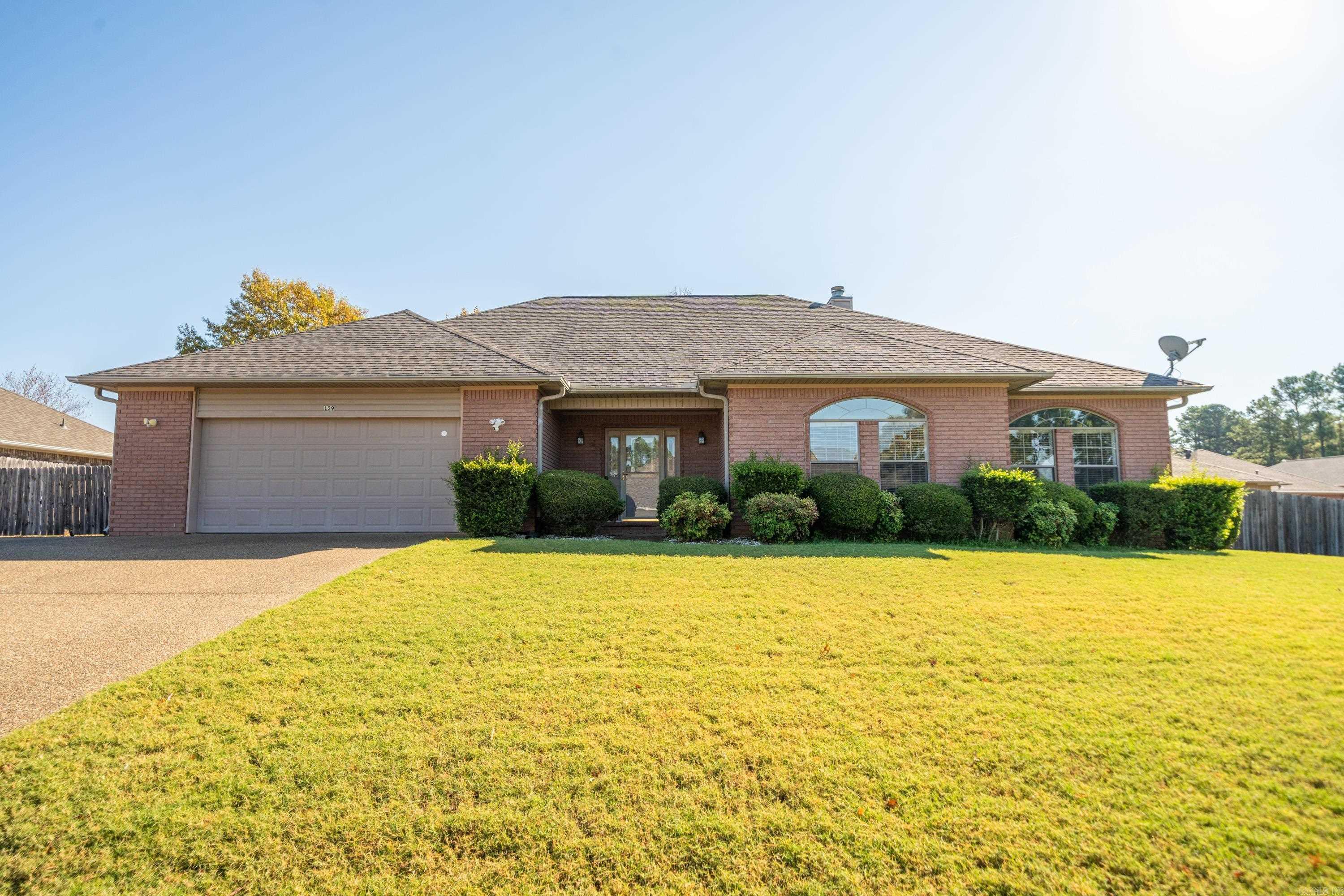 This beautiful 3/2 home in Deer View subdivision is bound to be your forever home. Great features fill this home with a few additional benefits. As you enter the front door you are greeted by a large living room with plenty of room to entertain. A gas starter fireplace will help warm those cold evenings and set the ambiance of relaxation. A full kitchen/dining combo with a large pantry is ready for all your family meals. Electric stove, microwave, dishwasher and the refrigerator stays! Lots of counter space and storage. The large primary suite and bath are a homeowners delight. Relax in your spa tub as you enjoy lots of natural light and double vanities. The walk-in-closet finishes out the primary area with plenty of room for everyone's clothes. The other 2 bedrooms and guest bath are functional and spacious and ready to be filled with your furniture. The large back yard has room for your firepit, playground and a garden. It also has an onsite built storage building big enough to fit all your lawn equipment, toys and garden supplies. There is a concrete pad/area to park and hook up your RV. A 2 car garage, whole house Generac generator, new roof 2023.