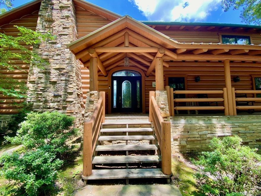 Breath taking views with year around water makes this beautiful 2,960 sqft+/- remote log cabin on Lake Hamilton a gem! This home invites you to take advantage of its open floor plan, 4 gorgeous bedrooms, 2.5 bathrooms, a cozy loft, wet bar, outdoor fireplace, screened in patio, open air pavilion, 2 slip floating boat dock, over 200' of lake frontage, and much more. Currently, operated as one of the most successful vacation rentals on Lake Hamilton and in the area!