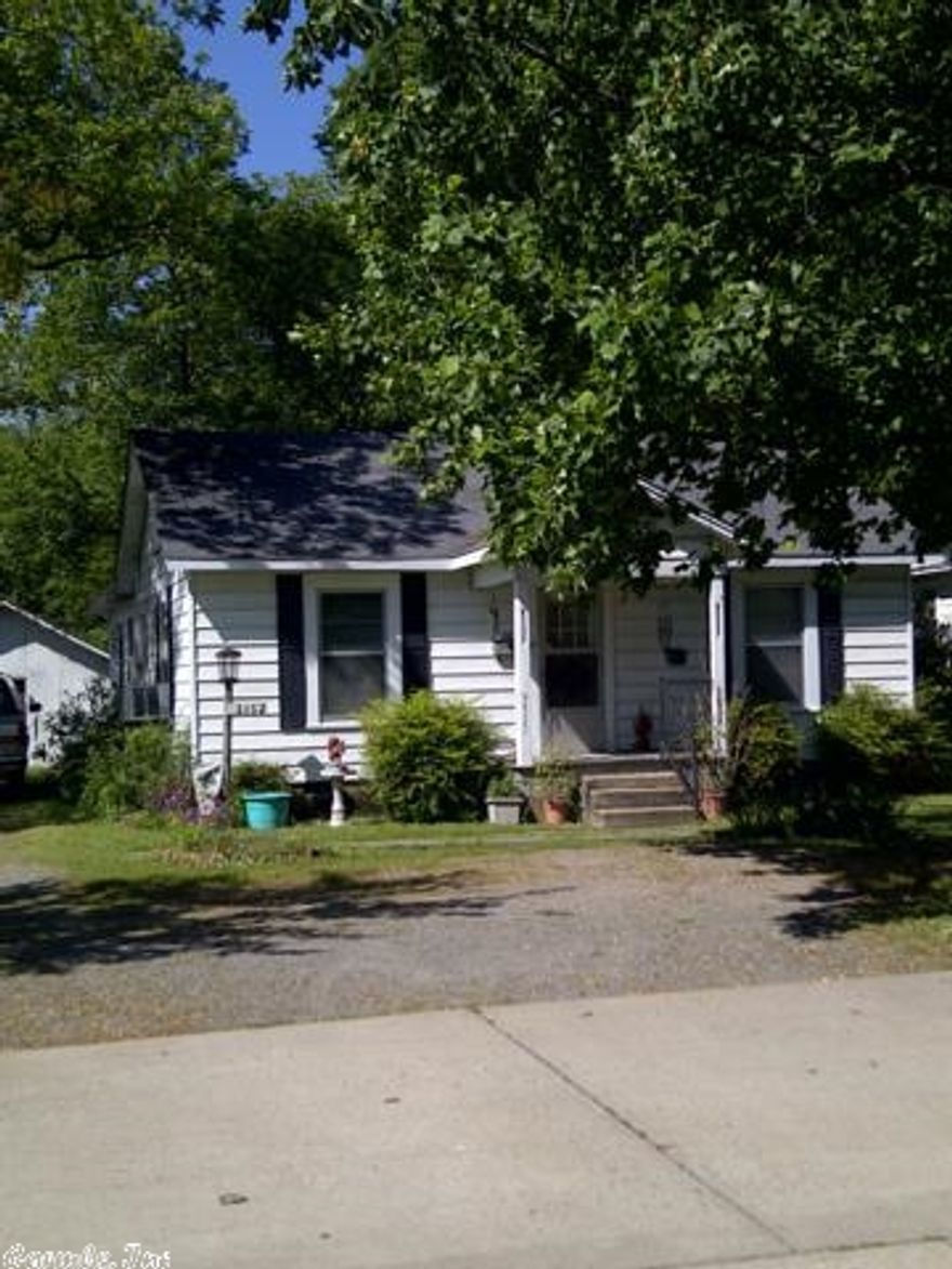 Home Sold AS IS but house is charming. Appliances convey. Nice shop at back of garage. Window units convey. Just a little TLC to have a cute home in the heart of Conway. Walk to schools, park and food establishments.