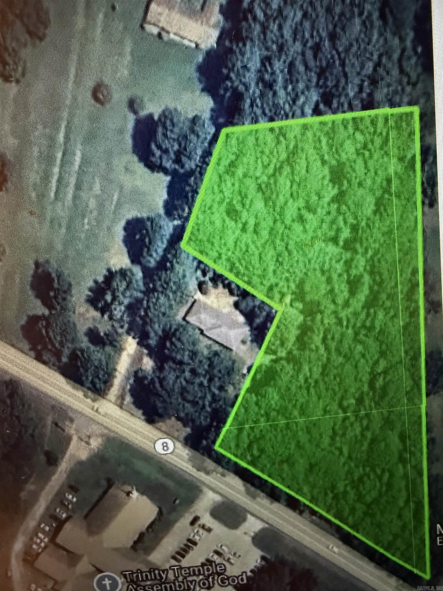 This wooded lot has road frontage along. Pine Street/Highway 8 and is a blank slate ready for the next business or home. Located just outside the city limits it provides easy access to I-30 and is close to all conveniences. There are two parcels of land in this acreage and comes with a new survey as well. Utilities are not on the property but are accessible from the highway. Call today for more details.