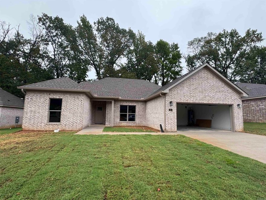 Welcome to Carmel Oaks, one of Cabot's newest communities, only 12 miles from the Little Rock Air Force Base.  This NEW construction floor plan offers 4-bedrooms and 2-bathrooms. As you enter, you’re greeted by tall ceilings, a cozy fireplace, crown molding, and an open floor plan that seamlessly connects the living, dining, and kitchen areas. The MASSIVE living area features natural light and a seamless flow into the designated dining area with a great view of the covered back patio! This home utilizes SOLAR board roof decking for energy efficiency. Other features include: floored attic space for ample storage, 42" custom kitchen cabinet upgrades, granite countertops, custom kitchen pantry with a receptacle for your coffee station, LVP flooring, tiled shower in the master bathroom, comfort height toilets, large custom walk-in master closet, 50 gallon water heater, recessed lighting AND ceiling fans, elegant finishes and neutral tones to enhance versatility. This property is also equipped with an irrigation system. Located in highly sought after Cabot School District. Several new-homes and floor plans to choose from! (Photos may not show exact finishes of this address.)