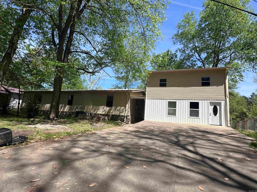 Escape to the peaceful beauty of the Little Red River with this affordable RVERFRONT property—perfect as a weekend getaway or a fantastic investment opportunity for rental income. Tucked away on a quiet dead-end road, this property offers privacy, relaxation, and direct access to some of the best fishing and outdoor recreation in the area. The main home features a spacious layout with a large living area ideal for gathering with family and friends, along with 4 comfortable bedrooms and 2 full baths. In addition, a newly built apartment provides even more flexibility, offering 2 bedrooms, a living area, and a full kitchen—perfect for guests, extended family, or additional rental income. Step outside and enjoy your private boat dock, making it easy to spend your days on the water. Whether you’re looking to unwind for the weekend, entertain, or maximize your investment with short-term rentals, this property checks all the boxes.