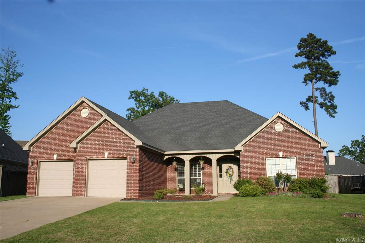As good as new! Freshly painted, clean and move-in ready! Very affordable home in Bryant's nice Westpointe North. Spacious layout featuring lg living area, fireplace, hardwood flrs, formal dining, eat-in kitchen w/ breakfast bar, lots of cabinets and granite counter tops, walk-in pantry. Lg master bedroom apart, mb bath featuring double sink vanity, walk-in shower, jetted corner tub, walk-in closet w/ tons of space! All brick w/ covered patio, privacy fenced backyard. Large 26' deep garage w/shelving.