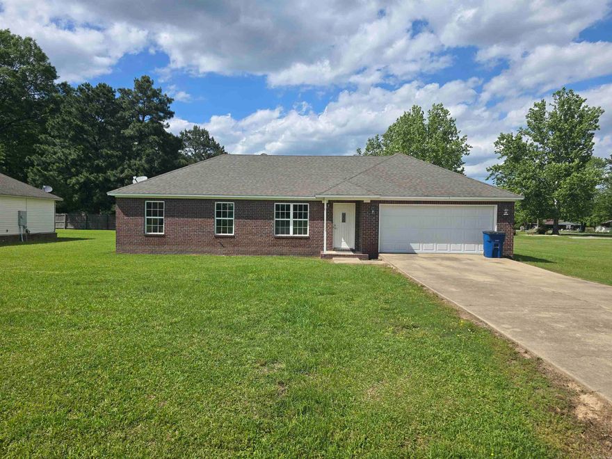 Welcome to your next home! This beautiful brick home features an open floor plan, with a spacious kitchen that has an abundance of cabinet space. The homes earth tones are sure to compliment any decor. Come see it today!