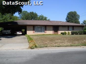 Excellent value i this 3BR 1 1/2 BA house. Located on a beautiful corner lot near JRMC, this house features a living-dining room- den and fenced back yard with a covered patio and storage building. Packed to move at $54,900.00.