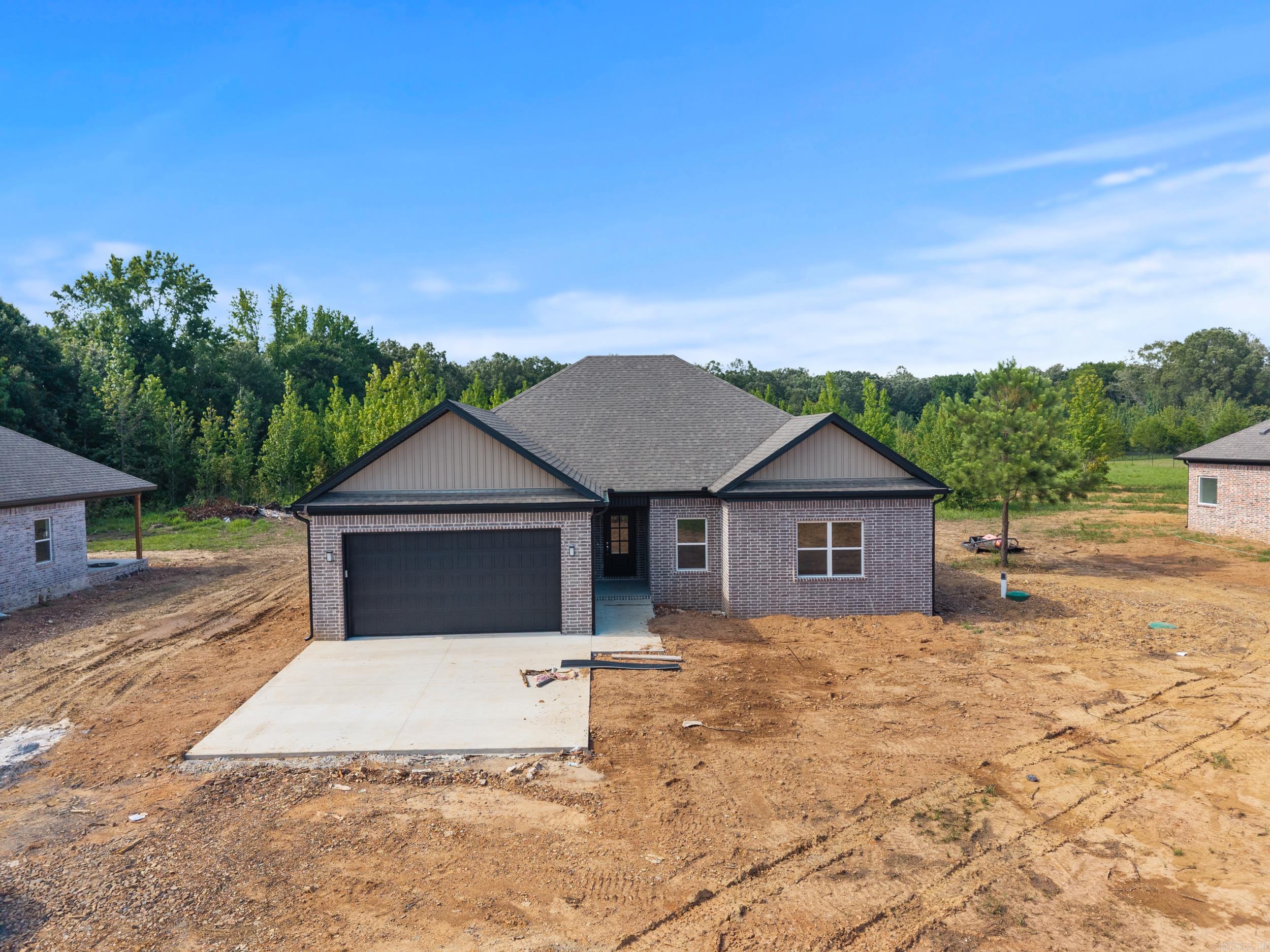 Welcome to this stunning New Construction: a 3-bedroom, 2-bathroom home with modern living space, situated on nearly an acre near Cabot, Jacksonville and Sherwood. This gem features an open floor plan, wood burning fireplace, a gourmet kitchen with top-tier appliances and sleek countertops, and a luxurious master suite with an en-suite bathroom. The expansive yard offers endless possibilities for outdoor enjoyment. Donāt miss this rare opportunity to own a high-quality, custom-built home in a prime location. *some photos were virtually staged!