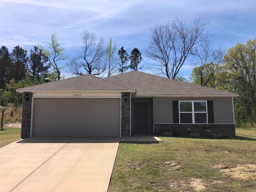 WELCOME HOME! This home is move in ready! Offering 1470 square feet of modern, thoughtfully designed living space. This 3 bedroom, 2 bathroom home features an inviting open floorpan that seamlessly connects the living, dining, and kitchen areas- perfect for both everyday living or entertaining.    The Kitchen is the heart of the home, boasting sleek finishes, ample cabinets and a spacious layout that flows effortlessly into the main living area filled with natural light. The split-bedroom design provides privacy, with a comfortable primary suite featuring a private bath and a generous closet with additional storage with shelving in the bathroom.     Enjoy the convenience of a newer construction , built in 2022, low maintenance living.  The refrigerator, washer and dryer, outdoor cameras,  all convey with the home adding extra value and making your move even easier!  Additional upgrades are flooring, added upper cabinets in laundry, extra lighting with dimmers throughout home, floored attic for storage, shelves added to linen closet in primary suite. Entire video surveillance conveys!  This home offers the perfect blend of comfort and style in a move in ready package