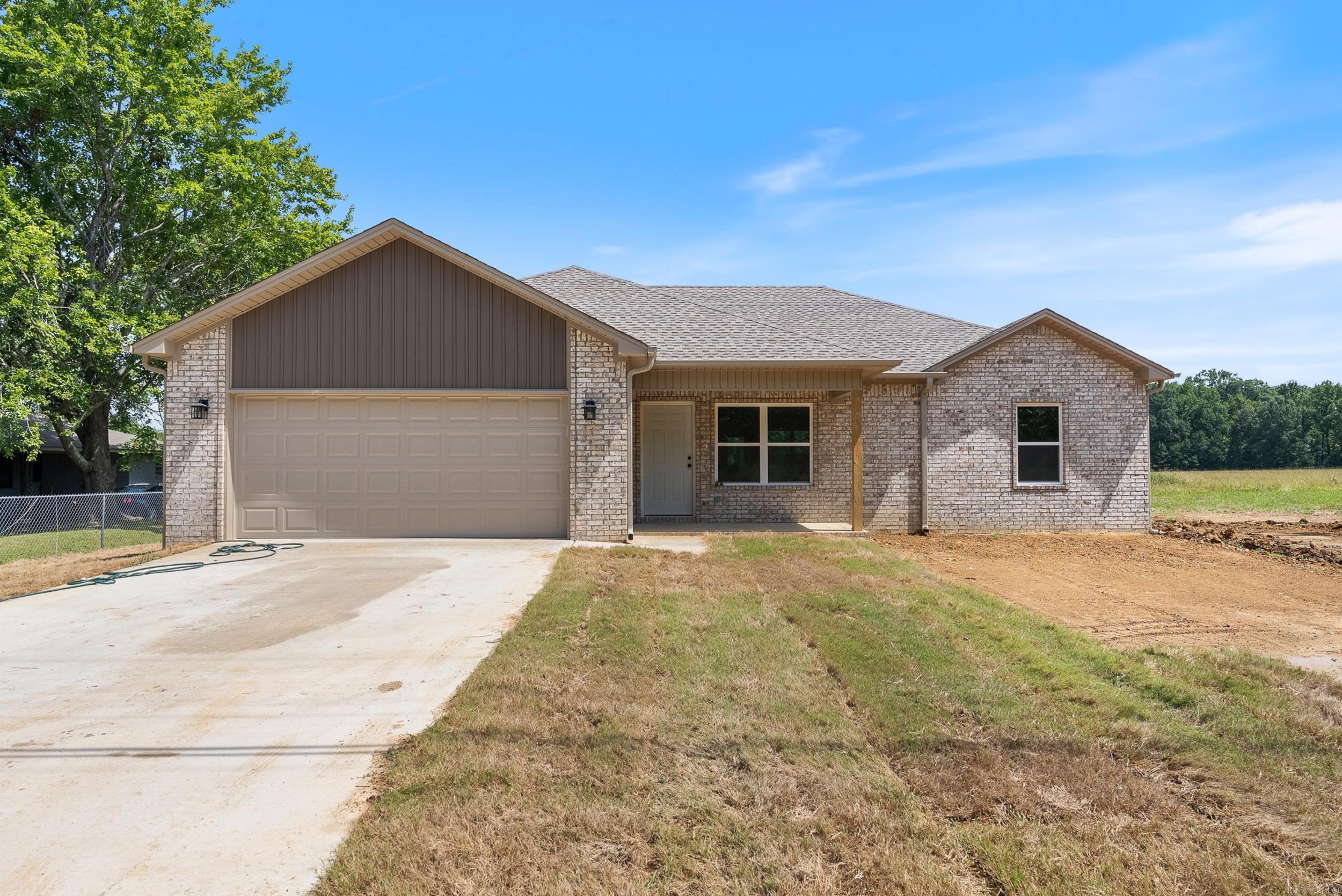 Welcome to this quality, new construction home built by Thomas Long Homes. This home features our Arkansas Plan - a fan favorite - with 3 bedrooms, 2 bathrooms, vaulted, open concept kitchen/dining/living, a great covered back porch, and a separate laundry room! This home is in an RD eligible area - so you could qualify for a $0 down payment loan! The interior features luxury vinyl plank floors throughout, tile shower in primary bath, granite countertops, and more! Minutes from I-57 and close to Highway 319, these homes are great for anyone working in Cabot, Beebe, Little Rock, Conway, or Searcy. We can't wait for you to make this your new home! Agents, please see remarks.