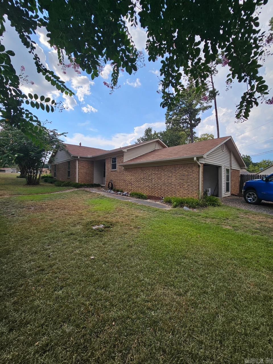 Lovely and well-kept 4 BEDROOM all brick home on quiet cul-de-sac! Nice wood & tile flooring, water heater installed in 2022, updated bathrooms, cozy fireplace, spacious laundry, vaulted ceiling in living/dining area, built-ins, garage, in-ground swimming pool with new liner, pool Crete, pump, filter, and valve house surrounded by full privacy fencing.